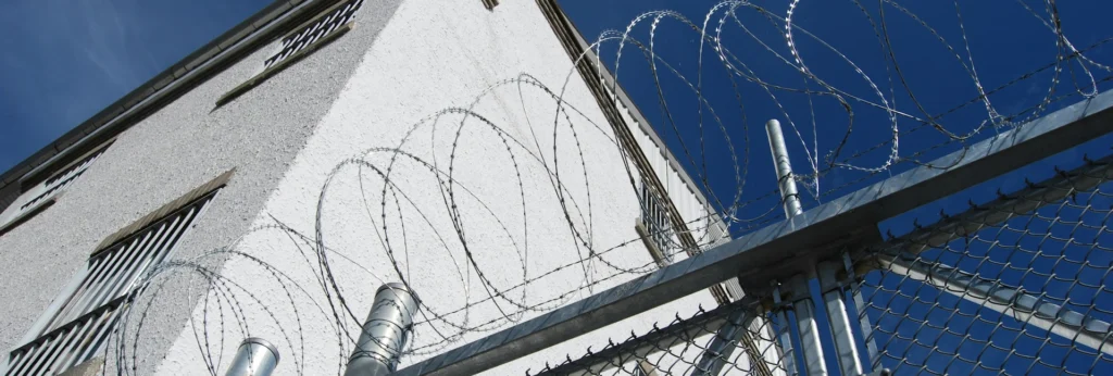 A barbed wire fence at a prison
